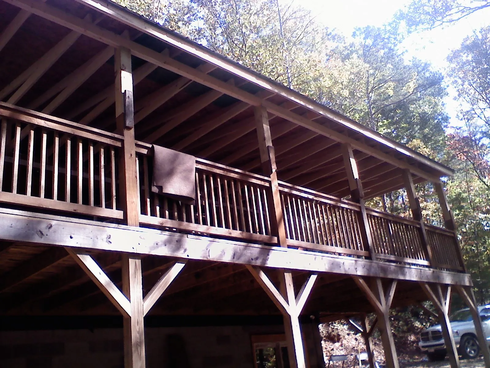 Timber framing under a new elevated porch and deck — Roof Leak Repair in Richland Center by Roofing Brothers